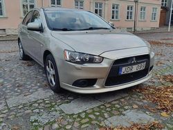 Brun Begagnad 2009 Mitsubishi Lancer Sportback Inform Halvkombi | 68 000 kr (Marknadspris)