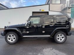 Svart Begagnad 2013 Jeep Wrangler Unlimited Sahara SUV | 209 900 kr