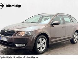 Mörkbrun Begagnad 2013 Skoda Octavia Ambition Kombi | 108 900 kr (Marknadspris)