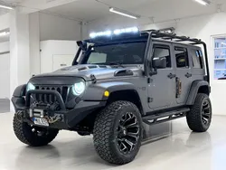 Grå Begagnad 2012 Jeep Wrangler Unlimited Sahara SUV | 329 900 kr (Dyr)