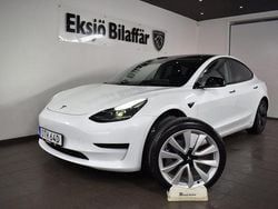 Vit metallic Begagnad 2021 Tesla Model 3 Standard Range Plus Sedan | 289 500 kr (Marknadspris)