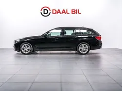Svart Begagnad 2018 BMW 520 Sport Line Kombi | 274 700 kr (Marknadspris)
