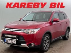 Mörkröd Begagnad 2014 Mitsubishi Outlander SUV | 158 900 kr (Marknadspris)