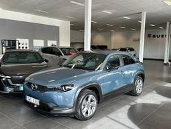 Grå Begagnad 2022 Mazda MX30 Exclusive-Line SUV | 159 900 kr (Marknadspris)