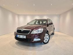 Mörkröd Begagnad 2010 Skoda Octavia Elegance Kombi | 49 900 kr (Marknadspris)