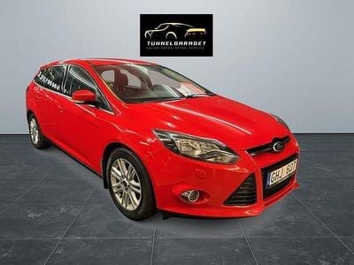 Begagnad Ford Focus Titanium 102 HK (75 kW) 2012 Röd Kombi