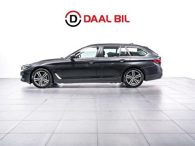 Grå Begagnad 2020 BMW 530e Sport Line Kombi | 289 700 kr (Marknadspris)