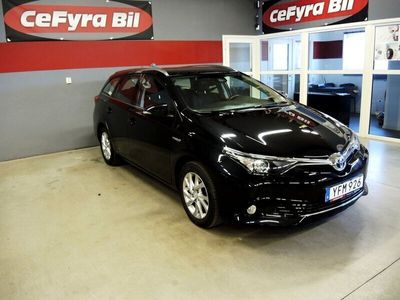 begagnad Toyota Auris Touring Sports Hybrid e-CVT Comfort lågmil