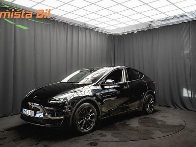 Begagnad Tesla Model Y Long Range AWD 378 kW (514 HK) 2023 Svart SUV