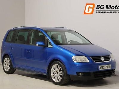 Blå Begagnad 2006 VW Touran Highline Minibuss | 29 900 kr