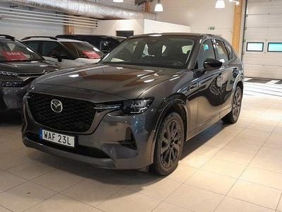 Mörkgrå metallic Begagnad 2022 Mazda CX-60 Homura-Line SUV | 389 900 kr (Marknadspris)