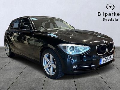 begagnad BMW 116 i 5-dörrars Steptronic Sport line Taklucka Euro 6 2013, Halvkombi