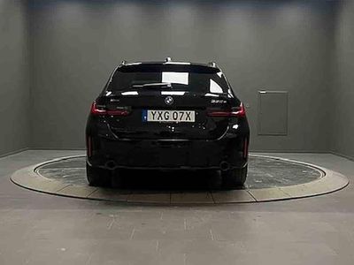 Svart Begagnad 2025 BMW 330e Kombi | 599 000 kr