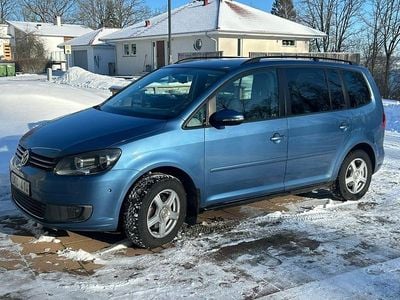 Begagnad VW Touran 140 HK (102 kW) 2011 Blå metallic Minibuss