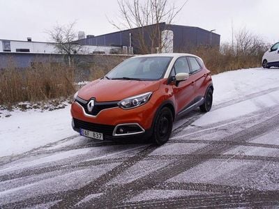 Orange med vitt tak Begagnad 2014 Renault Captur SUV | 119 900 kr (Marknadspris)