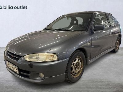 Begagnad Mitsubishi Colt 103 HK (75 kW) 2003 Mgrå Halvkombi