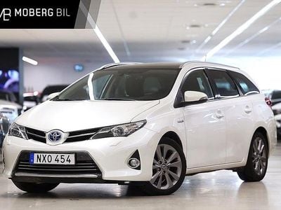 Vit Begagnad 2013 Toyota Auris Hybrid Executive Kombi | 124 900 kr (Marknadspris)