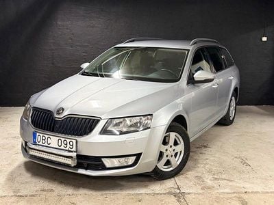 Begagnad Skoda Octavia Ambition 105 HK (77 kW) 2013 Silver Kombi