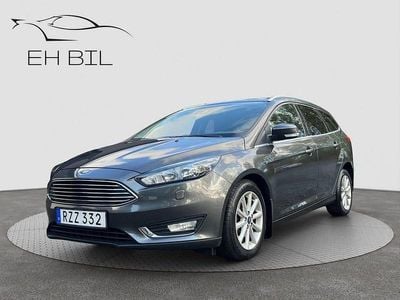 Mörkgrå (grå) Begagnad 2015 Ford Focus Titanium Kombi | 109 900 kr (Marknadspris)