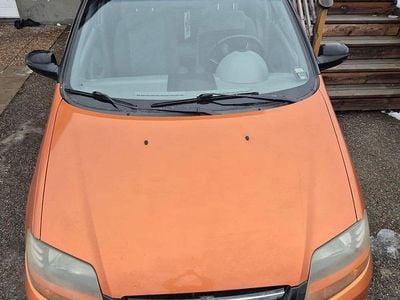 Bilen är orange/svart Begagnad 2005 Chevrolet Kalos | 19 000 kr (Marknadspris)