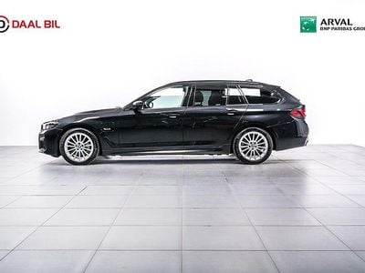 Svart Begagnad 2021 BMW 530e M Sport Kombi | 344 700 kr (Marknadspris)