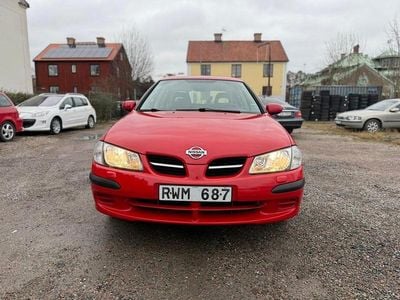 Röd Begagnad 2000 Nissan Almera Halvkombi | 24 500 kr (Marknadspris)