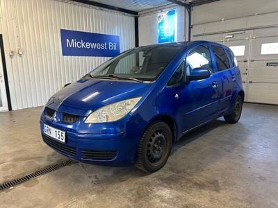 Begagnad Mitsubishi Colt 96 HK (70 kW) 2007 Blå Halvkombi