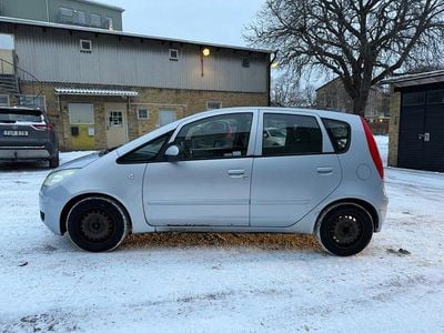 Begagnad Mitsubishi Colt 75 HK (55 kW) 2004 Blå Halvkombi
