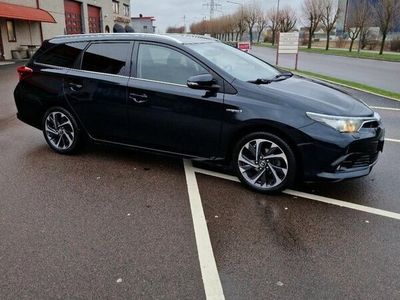 begagnad Toyota Auris Hybrid 1.8,