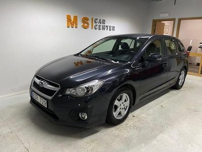 Begagnad Subaru Impreza 114 HK (83 kW) 2013 Mörkgrå Halvkombi