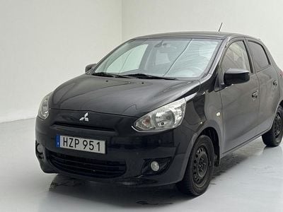 Svart Begagnad 2015 Mitsubishi Space Star | 72 000 kr (Marknadspris)