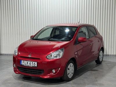 Begagnad Mitsubishi Space Star 80 HK (58 kW) 2014 Röd Halvkombi