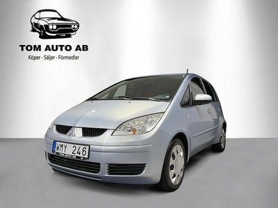 Begagnad Mitsubishi Colt 95 HK (69 kW) 2005 Blå Halvkombi