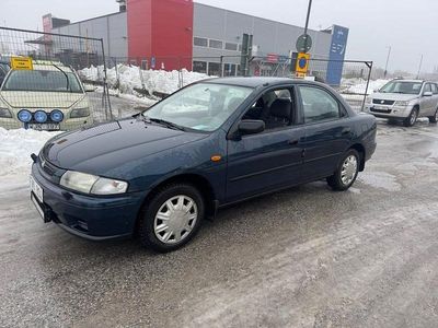 Begagnad Mazda 3 88 HK (64 kW) 1997 Blåmetallic Sedan