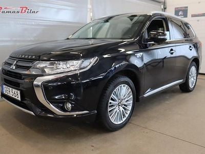 Svart Begagnad 2016 Mitsubishi Outlander P-HEV Comfort Edition SUV | 139 900 kr (Marknadspris)