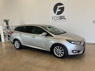 Grå Begagnad 2015 Ford Focus Titanium Kombi | 99 900 kr (Marknadspris)