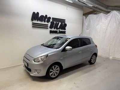 Begagnad Mitsubishi Space Star Comfort Edition 81 HK (59 kW) 2015 Silver Halvkombi