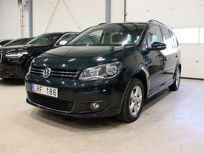 Begagnad VW Touran 105 HK (77 kW) 2013 Mörkgrön Minibuss