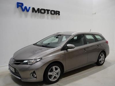 Begagnad Toyota Auris Touring Sports Executive 136 HK (100 kW) 2014 Brun Kombi