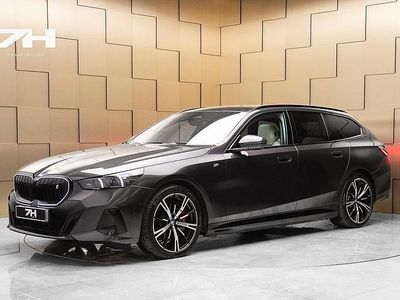 Grå Begagnad 2024 BMW i5 M Sport Kombi | 619 900 kr