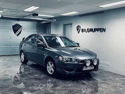 Begagnad Mitsubishi Lancer Inform 143 HK (105 kW) 2008 Grå Sedan