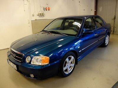 Begagnad Kia Magentis 169 HK (124 kW) 2004 Mörkblå Sedan