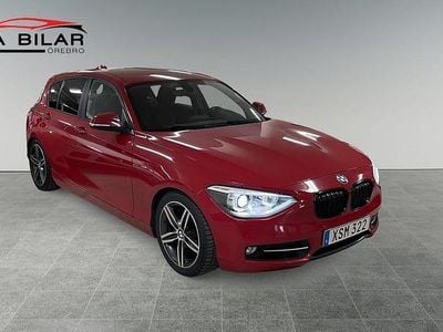 Begagnad BMW 118 Sport Line 143 HK (105 kW) 2014 Röd Halvkombi