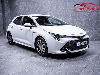 Begagnad Toyota Corolla Hybrid Style 184 HK (135 kW) 2019 Vit Halvkombi