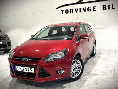 Röd Begagnad 2014 Ford Focus Titanium Kombi | 49 900 kr (Marknadspris)