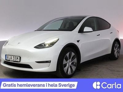 Vit Begagnad 2023 Tesla Model Y Long Range AWD SUV | 381 990 kr (Marknadspris)