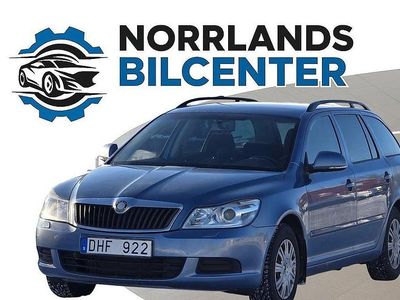 Begagnad Skoda Octavia Ambiente 122 HK (89 kW) 2010 Ljusgrå Kombi