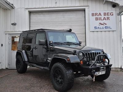 Svart Begagnad 2012 Jeep Wrangler Unlimited Sahara SUV | 299 000 kr