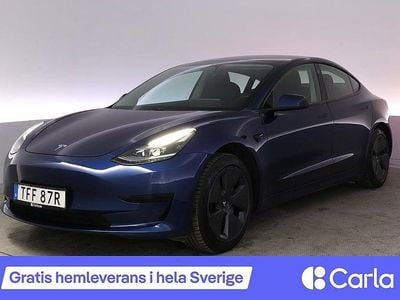 Blå Begagnad 2021 Tesla Model 3 Standard Range Plus Sedan | 288 990 kr (Marknadspris)