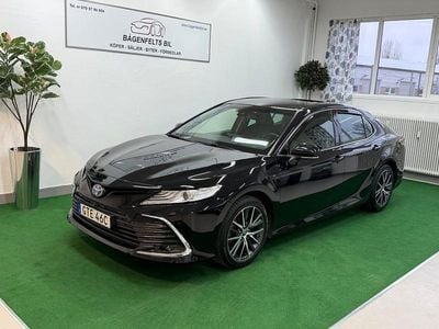 Svart Begagnad 2023 Toyota Camry Hybrid Executive | 309 500 kr
